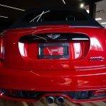 Vue d'arrière d'une Mini Cooper S Convertible rouge 2017 - EXO Automobiles