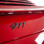 Logo Porsche 911 Carrera 2006 - EXO Automobiles
